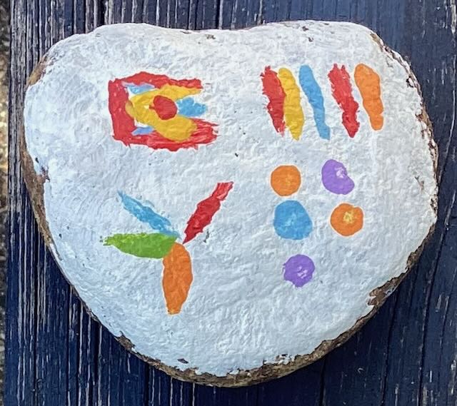 A rock after having the washable paint removed